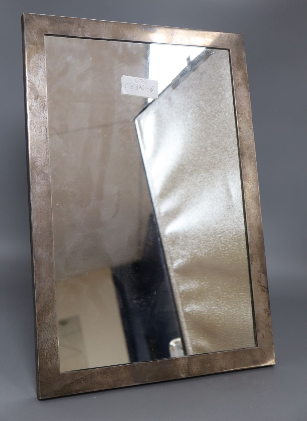 A George V large silver mounted rectangular easel mirror, John Collard Vickery, London, 1924, 46.4cm.